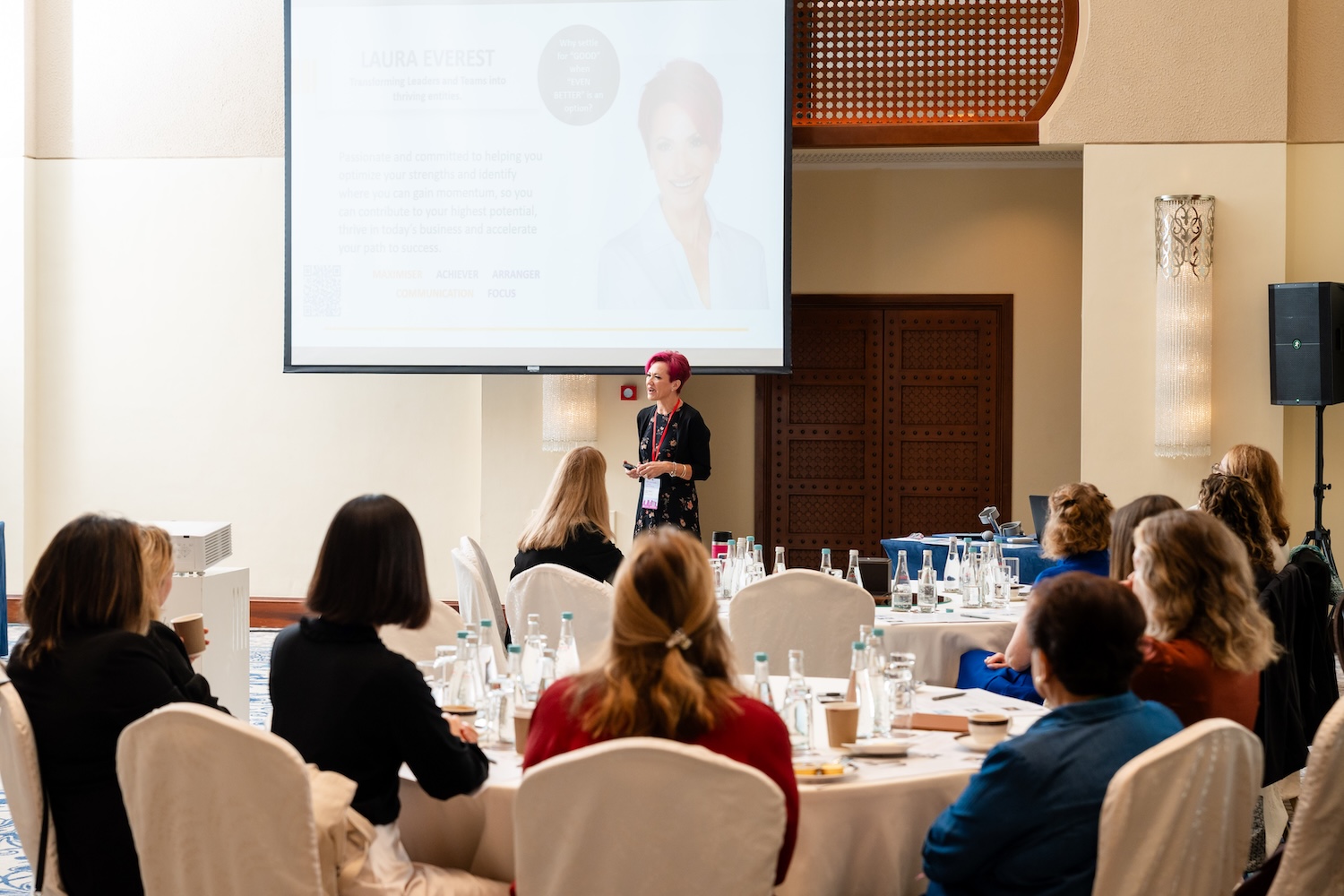 Laura Everest presenting to an audience
