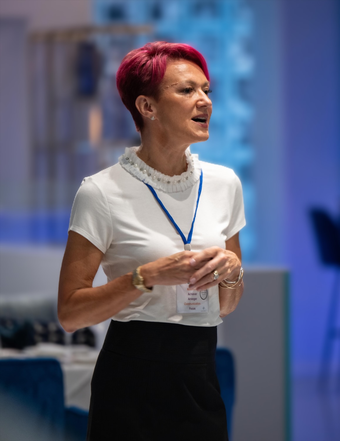Laura Everest speaking with a microphone